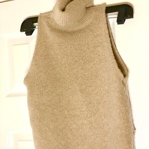 Womens tan sleeveless turtleneck crop top